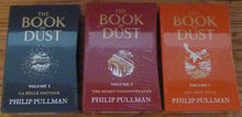 Load image into Gallery viewer, The Book of Dust Special Edition Trilogy: The Book of Dust: La Belle Sauvage vol. 1- The Secret Commonwealth vol, 2 (Vol. 1 & 2 are Exclusive Signed by the Author, Limited Slipcased Editions)- The Rose Field vol. 3 (Unsigned) plus extras