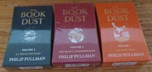 Load image into Gallery viewer, The Book of Dust Special Edition Trilogy: The Book of Dust: La Belle Sauvage vol. 1- The Secret Commonwealth vol, 2 (Vol. 1 &amp; 2 are Exclusive Signed by the Author, Limited Slipcased Editions)- The Rose Field vol. 3 (Unsigned) plus extras
